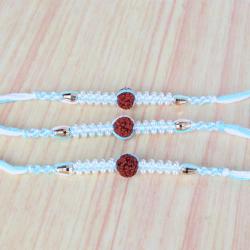 Three Rudraksha with Tiny Pearl Beads Rakhis
